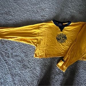 size m comfy yellow long sleeve with navy front design and accents.